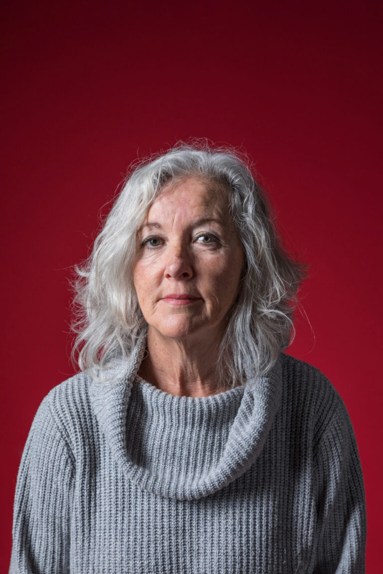 Victor Pineda listening attentively to a young disability advocate during a community dialogue, conveying empathy and support.